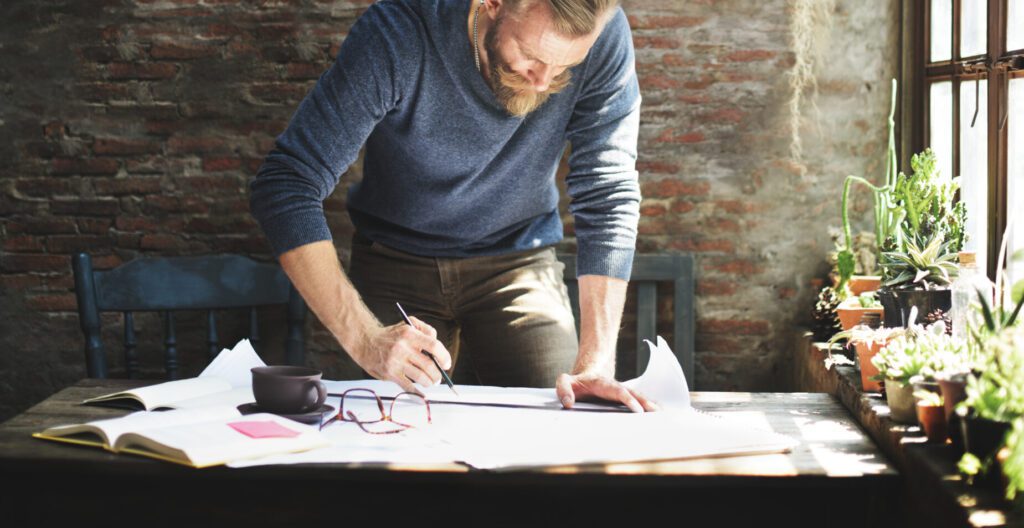 Man writing on paper