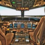 The view from the cockpit of a plane to show the value of an interim financial controller