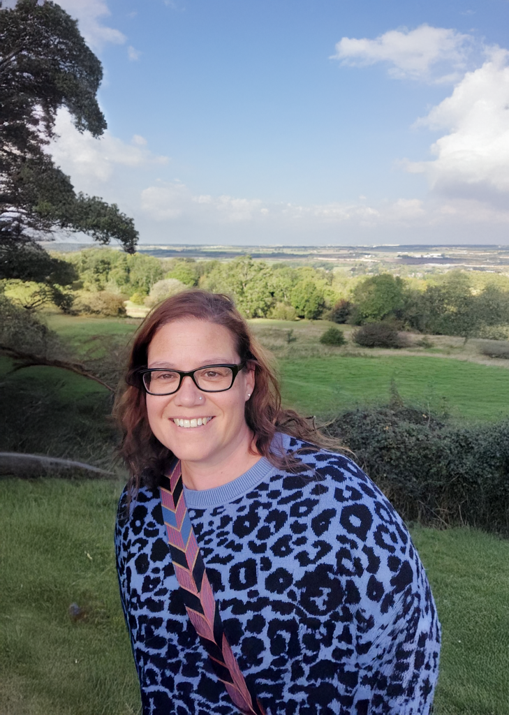 Steph taking a career break through a scenic view
