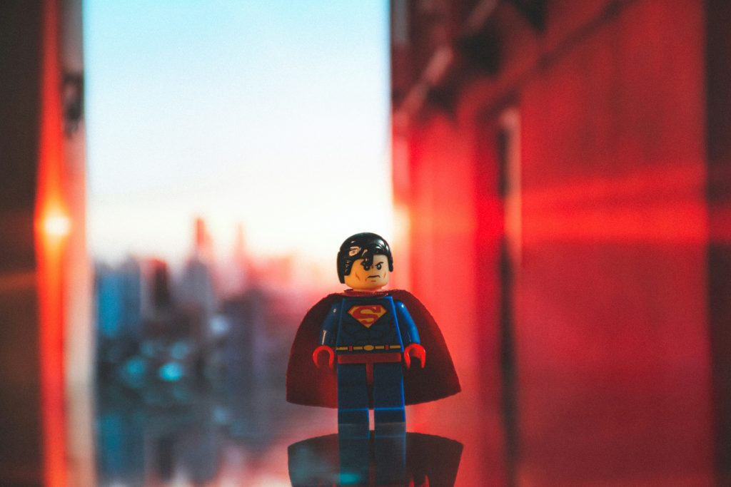 A lego superman figure in front of a skyline showing how understanding Financial ratios for SMEs is good for business