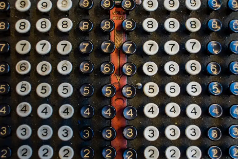 Old fashioned counting machine to highlight changes to finance function