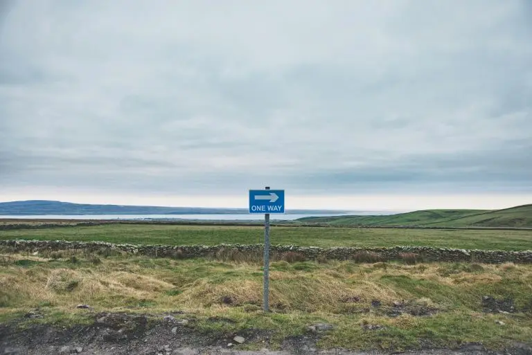 a sign in the distance showing choosing the first AI task for a small finance team